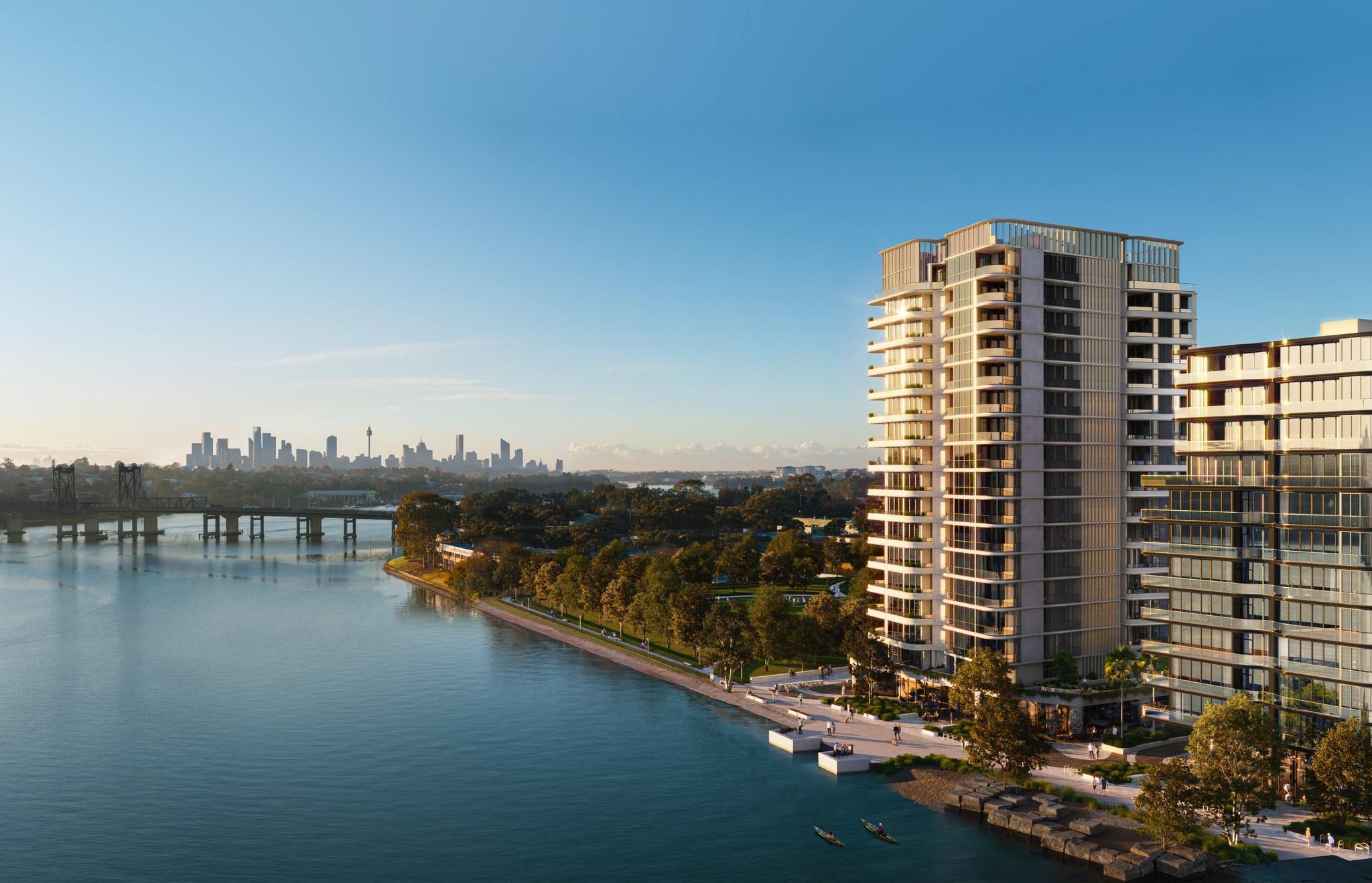 Waterfront apartment development with the Sydney skyline