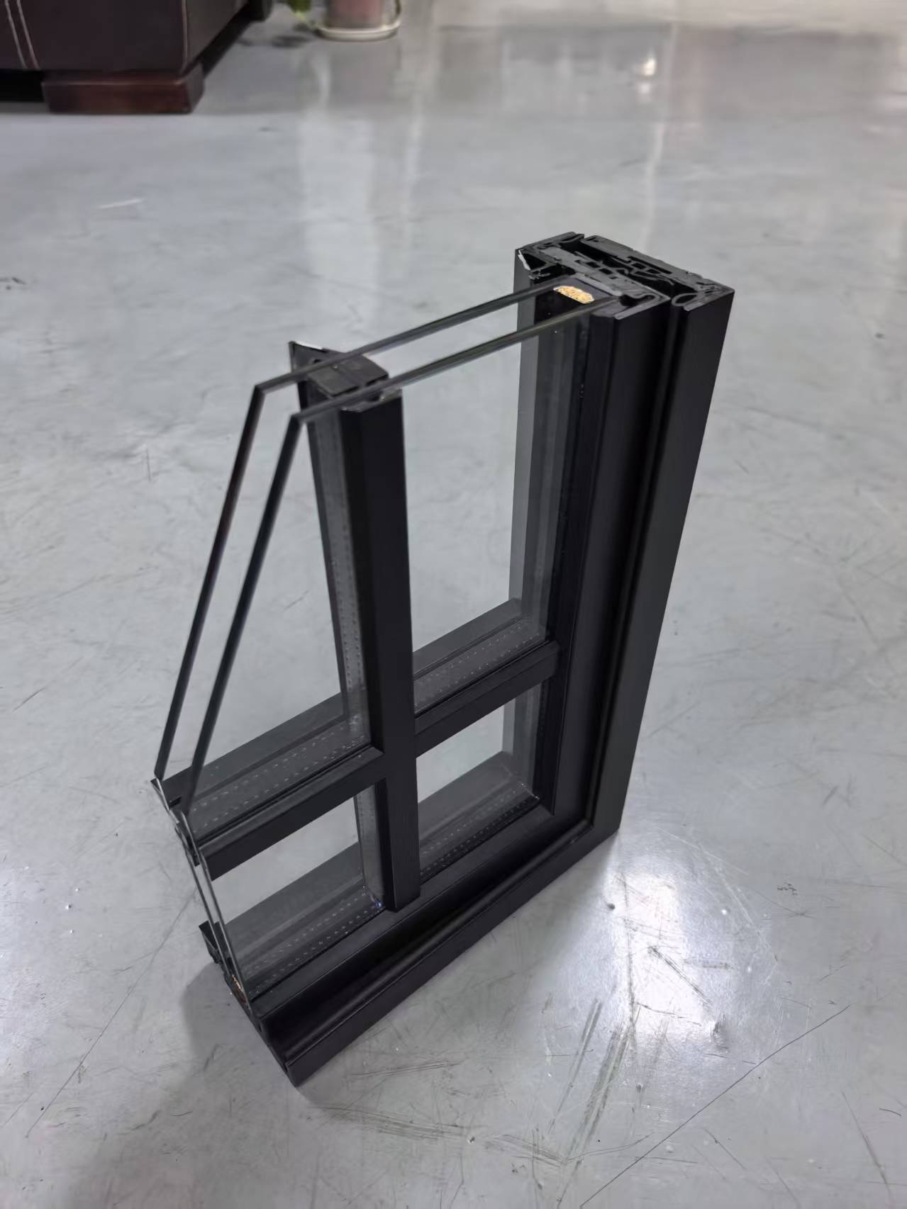 Double-glazed steel profile sample